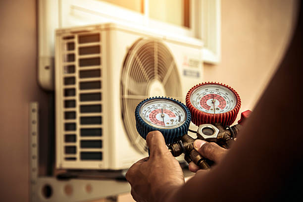 Professional Air Conditioning Service technician working in Harford, NY